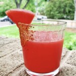 Watermelon margarita on a brick ledge